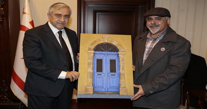 CUMHURBAŞKANI AKINCI, MADALYALI FOTOĞRAFÇI EVİRGEN’İ KABUL ETTİ