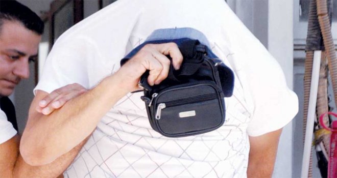 Eşini dolandırdı,çek sahteledi