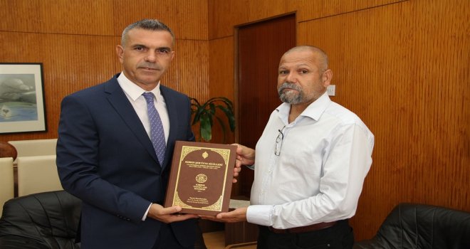 KIBRIS ŞER’İYYE SİCİLLERİ KİTABI ULUÇAY’A TAKDİM EDİLDİ